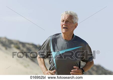 portrait of mature man jogging View Large Photo Image Stock Image - portrait of mature man jogging. Fotosearch
