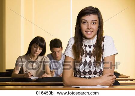 portrait of smiling female student in school seminar View Large Photo Image Stock Image - portrait of smiling female student in school seminar. Fotosearch