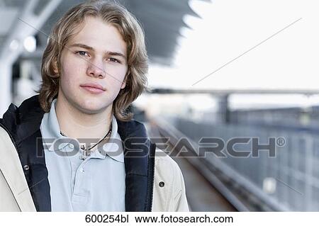 Stock Image - portrait of teenage boy at station. Fotosearch