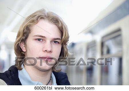 portrait of teenage boy at station View Large Photo Image Stock Image - portrait of teenage boy at station. Fotosearch