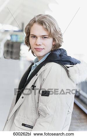 portrait of teenage boy at station View Large Photo Image Stock Image - portrait of teenage boy at station. Fotosearch