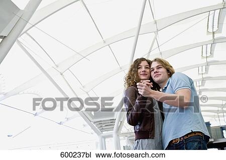 portrait of two teenagers holding each other View Large Photo Image Stock Image - portrait of two teenagers holding each other. Fotosearch