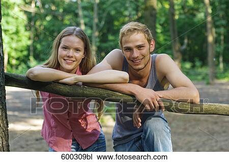 Stock Image - portrait of young couple outdoors. Fotosearch