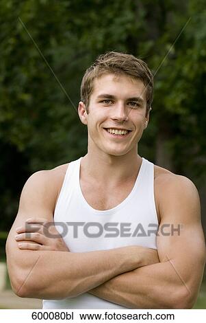 Stock Image - portrait of young man in sportswear. Fotosearch