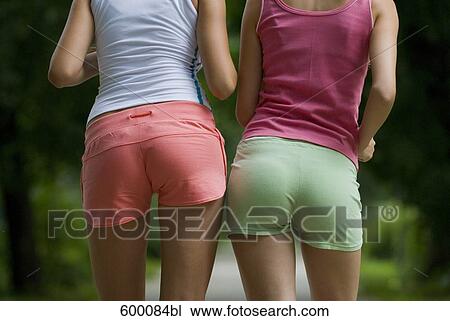 rear view of two young women in sportswear View Large Photo Image Stock Image - rear view of two young women in sportswear. Fotosearch