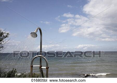shower on beach splashing water View Large Photo Image Stock Image - shower on beach splashing water. Fotosearch