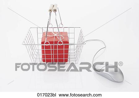 still life of computer mouse and present in shopping basket View Large Photo Image Stock Image - still life of computer mouse and present in shopping basket. Fotosearch