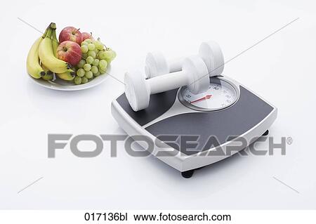 still life of scales dumb bells and plate with fruit View Large Photo Image Stock Image - still life of scales dumb bells and plate with fruit. Fotosearch