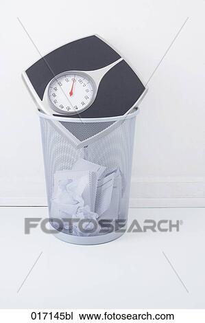 still life of scales in wastebasket View Large Photo Image Stock Image - still life of scales in wastebasket. Fotosearch