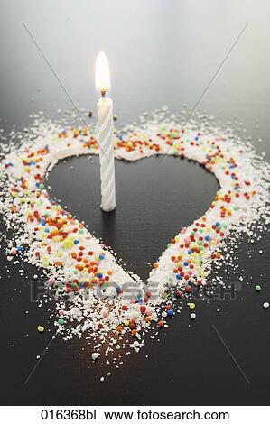 still life of shape of heart made of icing sugar with burning candle View Large Photo Image Stock Image - still life of shape of heart made of icing sugar with burning candle. Fotosearch