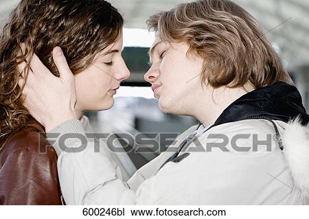 teenage couple about to kiss View Large Photo Image Stock Image - teenage couple about to kiss. Fotosearch