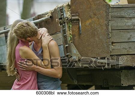 young couple kissing each other View Large Photo Image Stock Image - young couple kissing each other. Fotosearch