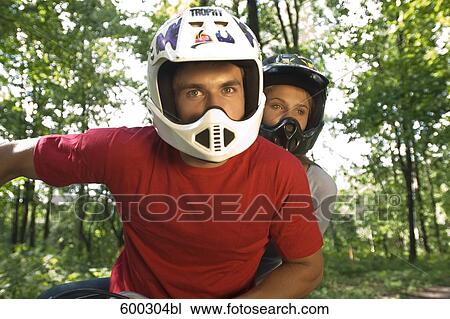 young man and girlfriend driving on quad through forest View Large Photo Image Stock Image - young man and girlfriend driving on quad through forest. Fotosearch