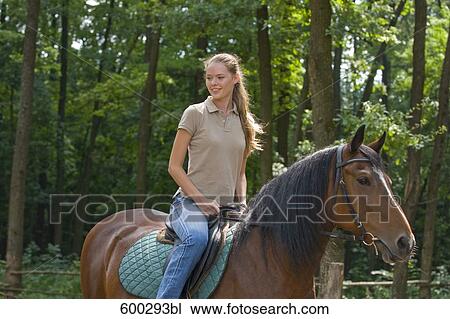 young woman on horse View Large Photo Image Stock Image - young woman on horse. Fotosearch