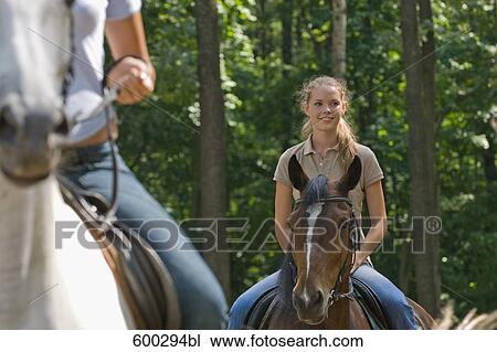 young woman on horse View Large Photo Image Stock Image - young woman on horse. Fotosearch