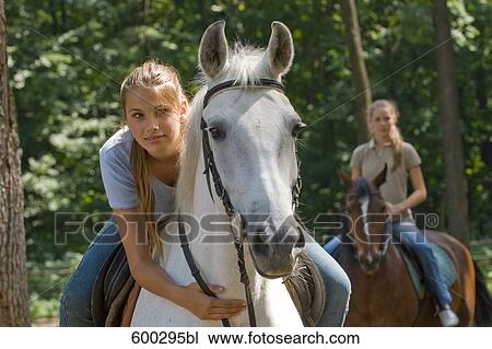 young woman on white horse View Large Photo Image Stock Image - young woman on white horse. Fotosearch
