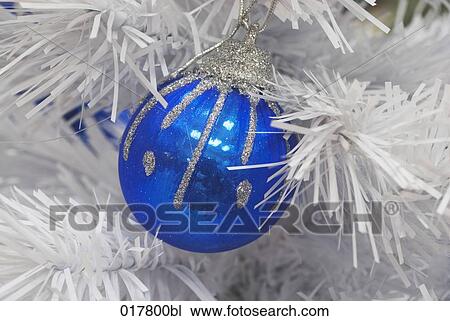 blue bauble hanging on christmas tree View Large Photo Image Stock Image - blue bauble hanging on christmas tree. Fotosearch