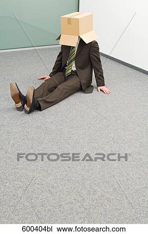 businessman sitting in corner with cardboard box over his head View Large Photo Image Stock Image - businessman sitting in corner with cardboard box over his head. Fotosearch