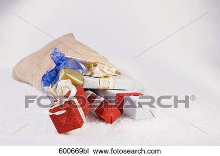 christmas presents pouring out of sack View Large Photo Image Stock Image - christmas presents pouring out of sack. Fotosearch