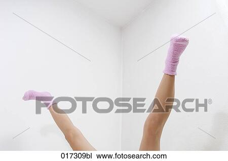 detail of woman wearing pink socks while having fun in bed View Large Photo Image Stock Image - detail of woman wearing pink socks while having fun in bed. Fotosearch