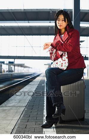 full body portrait of japanese woman waiting for train View Large Photo Image Stock Image - full body portrait of japanese woman waiting for train. Fotosearch