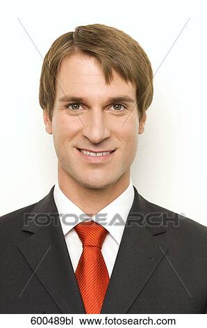 headshot of businessman wearing red tie View Large Photo Image Stock Image - headshot of businessman wearing red tie. Fotosearch