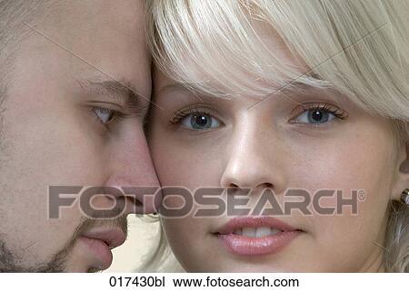 headshot of young couple man looking doubtful View Large Photo Image Stock Image - headshot of young couple man looking doubtful. Fotosearch