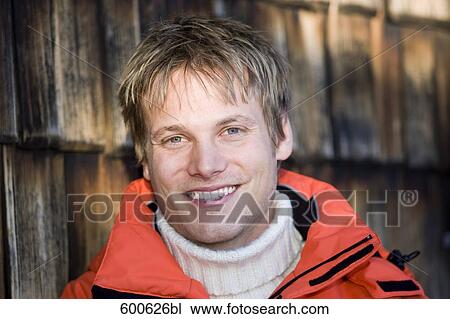 headshot of young man in winter View Large Photo Image Stock Image - headshot of young man in winter. Fotosearch