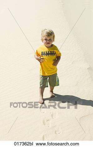 high angle portrait of little boy on beach View Large Photo Image Stock Image - high angle portrait of little boy on beach. Fotosearch