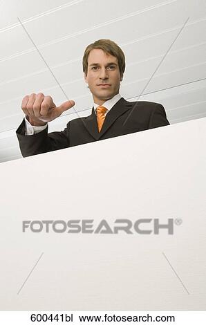 portrait of businessman doing the thumbs down sign View Large Photo Image Stock Image - portrait of businessman doing the thumbs down sign. Fotosearch