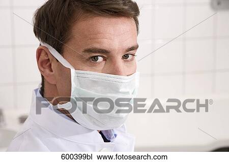 portrait of doctor wearing medical mask View Large Photo Image Stock Image - portrait of doctor wearing medical mask. Fotosearch