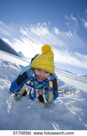 portrait of happy girl on sledge View Large Photo Image Stock Image - portrait of happy girl on sledge. Fotosearch