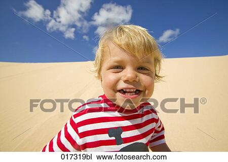 portrait of little boy on sand dune View Large Photo Image Stock Image - portrait of little boy on sand dune. Fotosearch