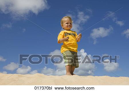 portrait of little boy on sandy beach View Large Photo Image Stock Image - portrait of little boy on sandy beach. Fotosearch