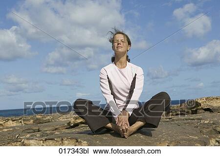 portrait of woman meditating in nature View Large Photo Image Stock Image - portrait of woman meditating in nature. Fotosearch