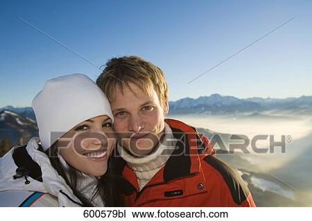 portrait of young couple in the mountains View Large Photo Image Stock Image - portrait of young couple in the mountains. Fotosearch
