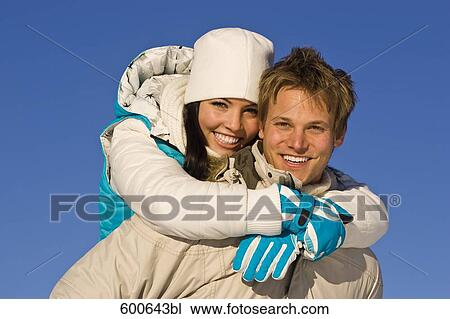 Stock Image - portrait of young couple in winter. Fotosearch