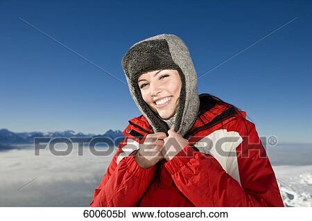 portrait of young woman in the mountains wearing hat View Large Photo Image Stock Image - portrait of young woman in the mountains wearing hat. Fotosearch