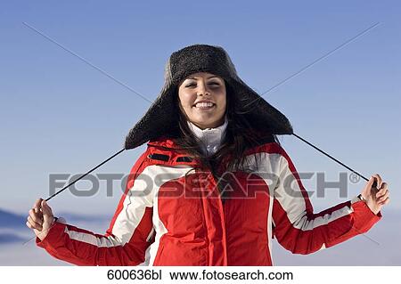 portrait of young woman in the mountains wearing hat View Large Photo Image Stock Image - portrait of young woman in the mountains wearing hat. Fotosearch