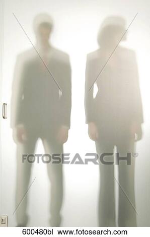 shapes of businessman and female colleague behind glass door View Large Photo Image Stock Image - shapes of businessman and female colleague behind glass door. Fotosearch