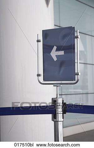Stock Image - sign with arrow showing direction. Fotosearch