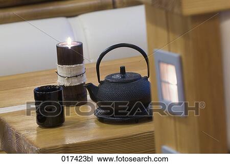 still life of asian teapot cup and candle View Large Photo Image Stock Image - still life of asian teapot cup and candle. Fotosearch