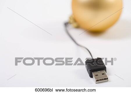 still life of bauble connected to computer cable View Large Photo Image Stock Image - still life of bauble connected to computer cable. Fotosearch