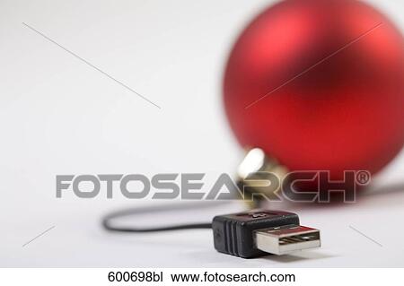 still life of bauble connected to computer cable View Large Photo Image Stock Image - still life of bauble connected to computer cable. Fotosearch