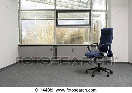 still life of chair in empty office space View Large Photo Image Stock Image - still life of chair in empty office space . Fotosearch