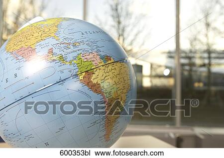 still life of globe in front of window View Large Photo Image Stock Image - still life of globe in front of window . Fotosearch