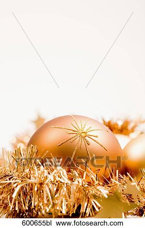 still life of golden baubles and garlands View Large Photo Image Stock Image - still life of golden baubles and garlands. Fotosearch