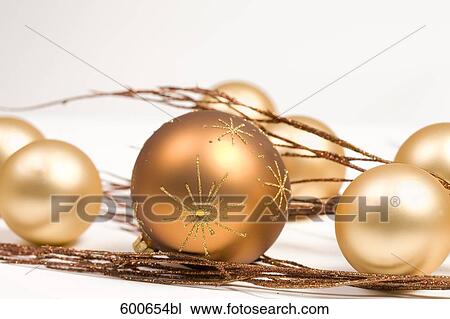 still life of golden baubles and twigs View Large Photo Image Stock Image - still life of golden baubles and twigs. Fotosearch