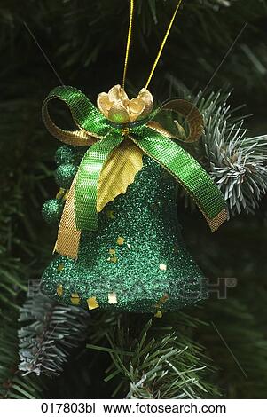still life of little bell hanging on christmas tree View Large Photo Image Stock Image - still life of little bell hanging on christmas tree. Fotosearch