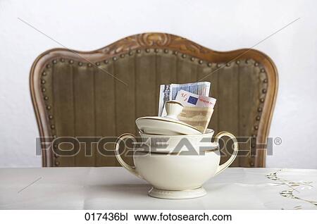 still life of money in sugar bowl View Large Photo Image Stock Image - still life of money in sugar bowl. Fotosearch